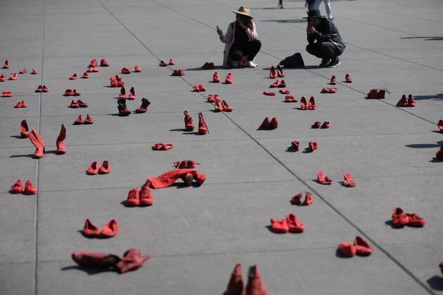View of red shows as part of an exhibition by Mexican Artist Emilia Chauvet, at the Zocalo of Mexico City, Mexico, 11 January 2020. The artwork is actually a movement against sexist violence created by the artist over a decade ago, after her sister was murdered by her boyfriend. Obra Zapatos rojo llega al Zócalo mexicano a concienciar sobre feminicidios !ACHTUNG: NUR REDAKTIONELLE NUTZUNG!  Copyright: xSashenkaxGutierrezx AME1091 20200111-637143785390708000
