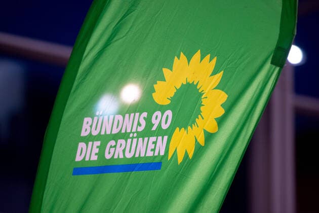 Herford, Germany 11 01 2020 Green Party parliamentary group chairman Hofreiter in Herford Anton Toni Hofreiter visiting Herford North Rhine-Westphalia at the Green District Association on the occasion of the 40th anniversary In picture A flag of the Green Party, logo, emblem, Herford North Rhine-Westphalia Germany Elsbach House