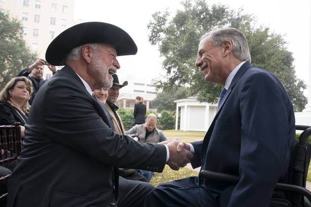 January 13, 2020, Austin, Texas, USA: Church shooting hero JACK WILSON of White Settlement (l) greets Gov. GREG ABBOTT as he accepts the Governor s Medal of Courage at the Texas Governor s Mansion. Wilson fired one round and killed a suspected church shooter on Dec. 29, 2019. Austin USA - ZUMAd150 20200113_znp_d150_023 Copyright: xBobxDaemmrichx