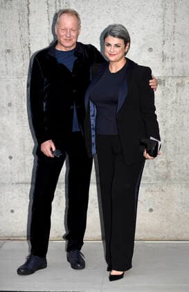 Milan, Milan Fashion Week, Man Fall Winter 2020 2021. Milan Men s Fashion Autumn Winter 2020 21. Giorgio Armani fashion show. Arrivals. Pictured: Stellan Skarsgard Meghan Everett  Copyright: xSimonaxChiocciax xIPAx xFotosickix