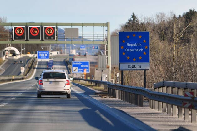Border crossing Walserberg Germany Austria with signs MAUT,TOLL,VIGNETTE, Autobahnvignette,Pickerl, Autobahn A8 near Bad Reichenhall road traffic,cars,Autobahn,