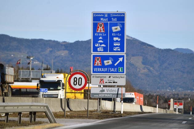 Border crossing Walserberg Germany Austria with signs MAUT,TOLL,VIGNETTE, Autobahnvignette,Pickerl, Autobahn A8 near Bad Reichenhall road traffic,cars,Autobahn,