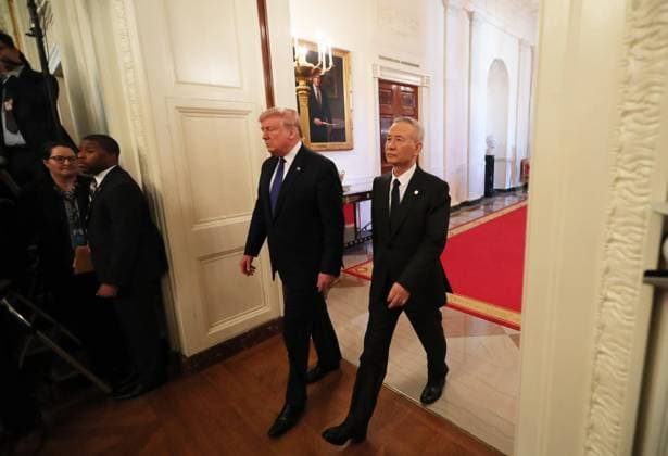 (200115) -- WASHINGTON D.C., Jan. 15, 2020 -- U.S. President Donald Trump and Chinese Vice Premier Liu He, who is also a member of the Political Bureau of the Communist Party of China Central Committee and chief of the Chinese side of the China-U.S. comprehensive economic dialogue, arrive at the East Room of the White House for the China-U.S. phase-one trade deal signing in Washington D.C., the United States, Jan. 15, 2020. ) U.S.-WASHINGTON D.C.-CHINA-U.S. PHASE-ONE TRADE DEAL-SIGNING WangxYing 