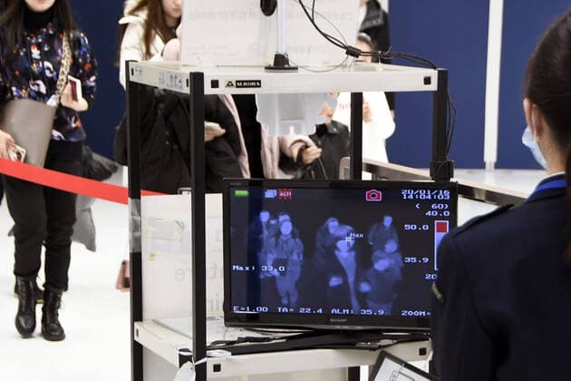 Japan confirms 1st case of infection with new coronavirus from China Travelers from China s Wuhan pass by body temperature scanners at Narita airport near Tokyo on Jan. 16, 2020. A resident of Japan s Kanagawa Prefecture in his 30s has tested positive in Japan s first confirmed case of pneumonia caused by a new coronavirus from China -- after traveling to Wuhan, central China, where an outbreak of pneumonia associated with the newly discovered virus began in December. 