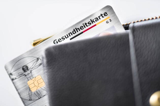 Medical practice, electronic health card sticking out of a wallet Health care 6