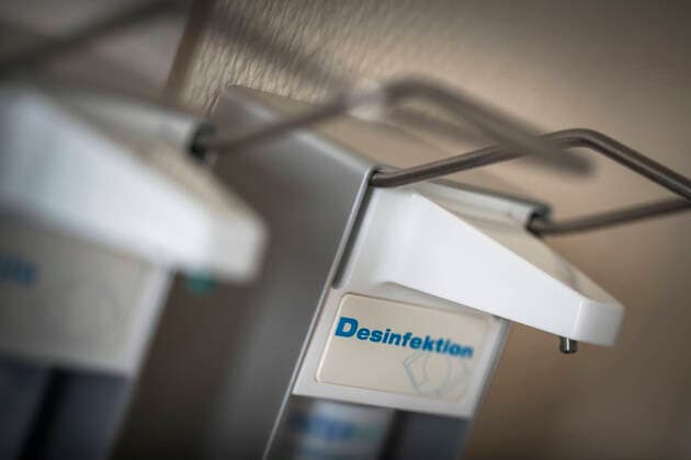 Medical practice, arm lever dispenser for hand disinfection on the wall Practice equipment 2