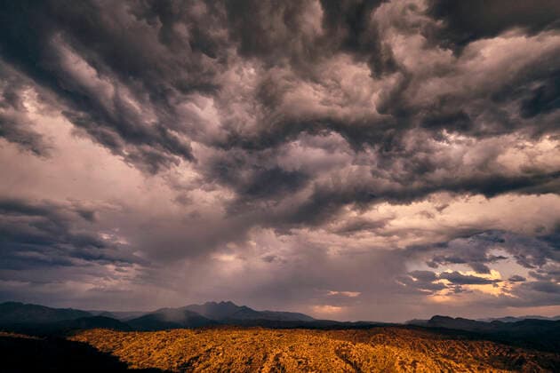 Creative Highlights World Ominous monsoon storm clouds over the Four Peaks Wilderness in Arizona Phoenix, Arizona CR_KYLE191104F-234845-01