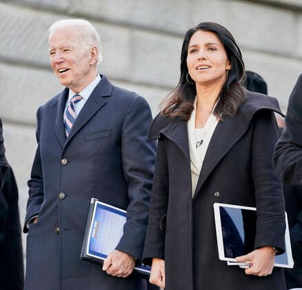 January 20, 2020, Columbia, South Carolina, USA: Former US Vice-president JOE BIDEN and fellow Democratic presidential nominee hopeful US Congresswoman TULSI GABBARD (D-HI) sing along during Martin Luther King Day celebrations in the state capital of Columbia. South Carolina hosts the fourth Democratic primary of the election season on Saturday February 29, 2020. Columbia USA  - ZUMA Pho 20200120_mda_j110_144 Copyright: xRustyxJonesx