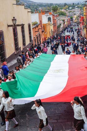 January 21, 2020, San Miguel De Allende, Guanajuato, Mexico: Young school girls carry a massive Mexican flag during a parade to celebrate the 251st birthday of the Mexican Independence hero Ignacio Allende January 21, 2020 in San Miguel de Allende, Guanajuato, Mexico. Allende, from a wealthy family in San Miguel played a major role in the independency war against Spain in 1810 and later honored by his home city by adding his name. San Miguel De Allende Mexico - ZUMAe02_ 20200121_zaf_e02_008 Copyright: xRichardxEllisx