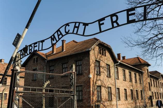 16 03 2015, Auschwitz, Lesser Poland, Republic of Poland, Europe Entrance gate of the former concentration camp Auschwitz I Main camp with the slogan Arbeit macht frei The lettering was applied to the entrances of numerous Nazi concentration camps