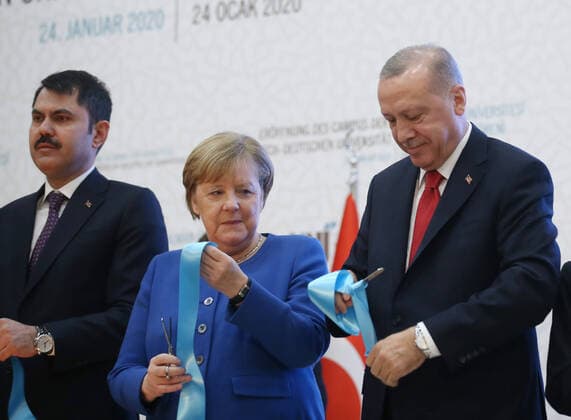 (200124) -- ISTANBUL, Jan. 24, 2020 -- German Chancellor Angela Merkel (C), accompanied by Turkish President Recep Tayyip Erdogan (R), cut the ribbon during the opening ceremony of the Turkish-German University in Istanbul, Turkey, Jan. 24, 2020. Merkel on Friday said her country appreciates Turkey s efforts in hosting millions of Syrian refugees on its soil. (Turkish Presidency Handout via Xinhua) TURKEY-ISTANBUL-TURKISH-GERMAN UNIVERSITY-OPENING CEREMONY XuxSuhui 