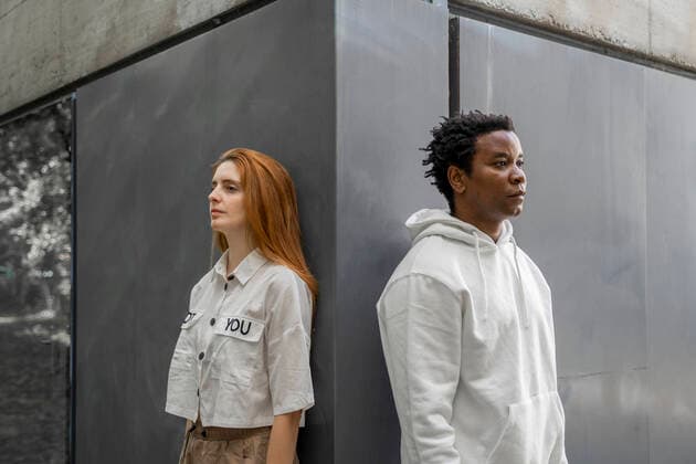 Portrait of a man and a woman leaning on a wall model released Symbolfoto  AFVF04992