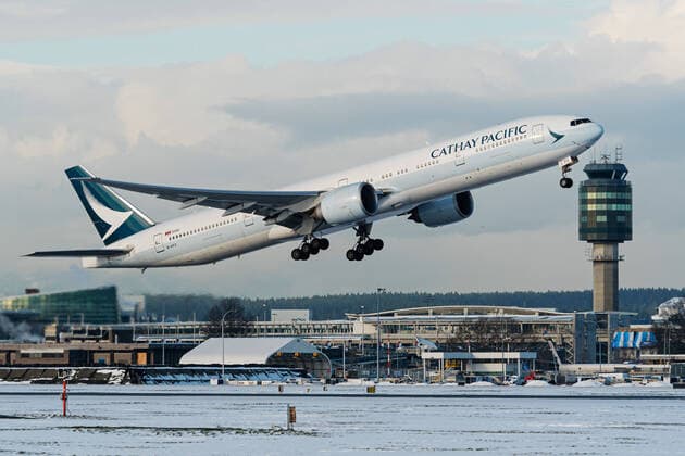 January 16, 2020, Richmond, British Columbia, Canada: A Cathay Pacific Airways Boeing Boeing 777-300ER (B-KPZ) wide-body jet airliner takes off from a snow covered Vancouver International Airport, Thursday, January 16, 2020. Richmond Canada - ZUMAs202 20200116_zap_s202_016 Copyright: xBaynexStanleyx