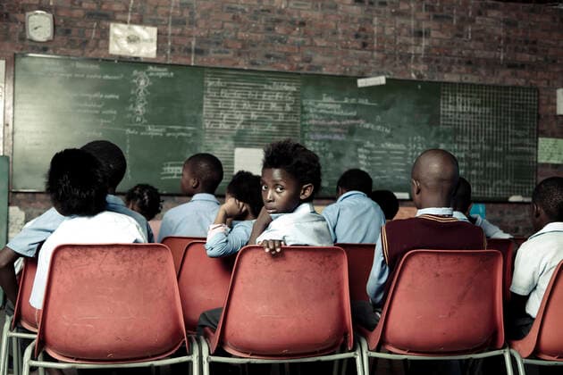 Group of African school children sitting in class  Copyright: xGreatstockx O-066-0495G