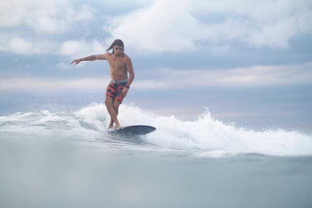 IMAGO Creative: Sommer Sport - Strand Surfing the sunrise in Costa Rica Jaco, Puntarenas Province, Costa Rica CR_AGMU191217-262222-01