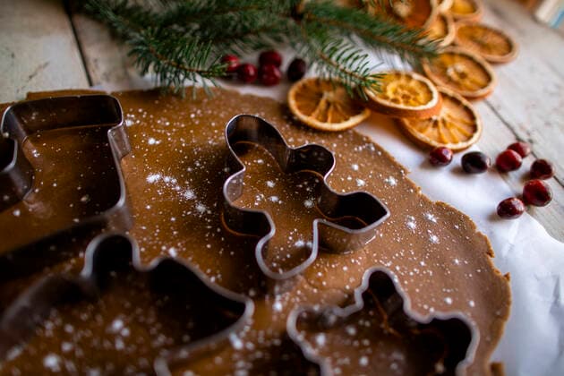 Festive gingerbread high side angle shot of cookie cutter on dough De Motte, IN, United States CR_CHSI200103-265593-01