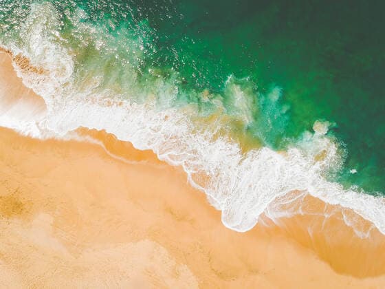 Aerial drone view of beach and sea waves crashing Todos Santos, B.C.S., Mexico CR_IRTO191216C-260216-01