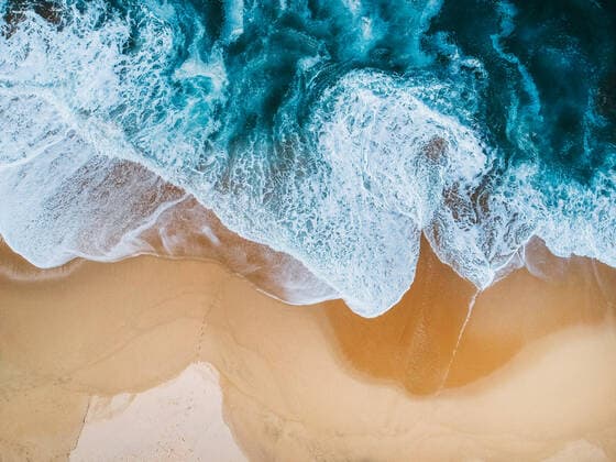 drone aerial view of ocean surf crashing on empty beach blue Todos Santos, B.C.S., Mexico CR_IRTO191216C-260217-01