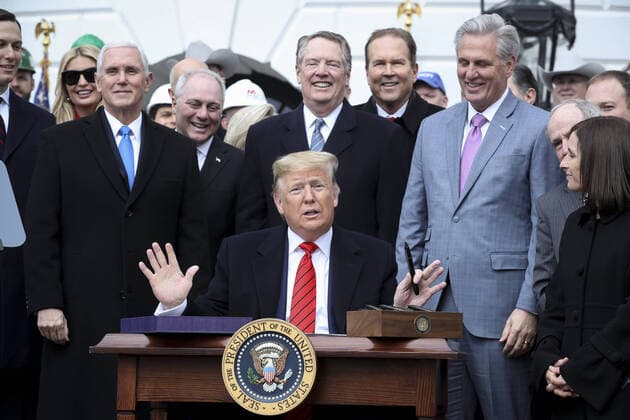 President Donald Trump speaks prior signing the United States-Mexico-Canada Trade Agreement on the South Lawn of the White House on Wednesday, January 29, 2020 in Washington, DC. Next to Trump, members of the Cabinet and members of the Congress.  WAX20200129204 OLIVERxCONTRERAS