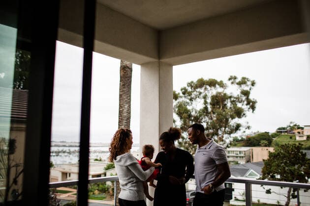 Blended Family Standing on Balcony Overlooking Ocean San Diego, CA, United States CR_JIDE200103-260904-01