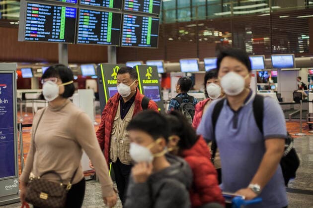 January 29, 2020, Singapore, China: A family seen wearing protective n95 masks as they walk around Changi Airport in Singapore. Singapore China - ZUMAs197 20200129_zab_s197_023 Copyright: xMaverickxAsiox