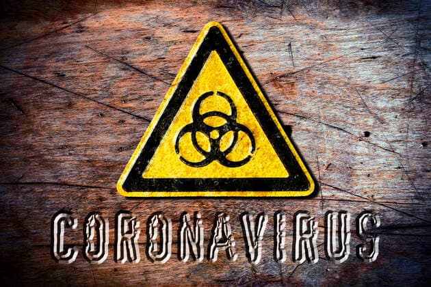 PHOTOMONTAY, biohazard sign and Coronavirus lettering ** NUR FUER REDAKTIONELLE ZWECKE ** EDITORIAL USE ONLY **