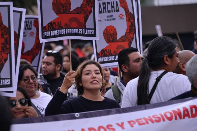 National Struggle Day protest in Mexico MEXICO CITY, MEXICO - JANUARY 31: Demonstrators take part during a march called National Struggle Day to protest for labor equality and demand labor rights and demand a job stability program during the demonstration, integrants of Union of Telephone Operators of the Mexican Republic, National Workers Union, Mexican Union of Electricians, Independent Workers Union of the Autonomous Metropolitan University participating to demand from the Federal Government a change of economic, political and social course for the country; as well as a dialogue around the Alternative Nation Project. at Reforma Avenue on January 31, 2020 in Mexico City, Mexico Copyright: xCarlosxTischlerx EYE_6543