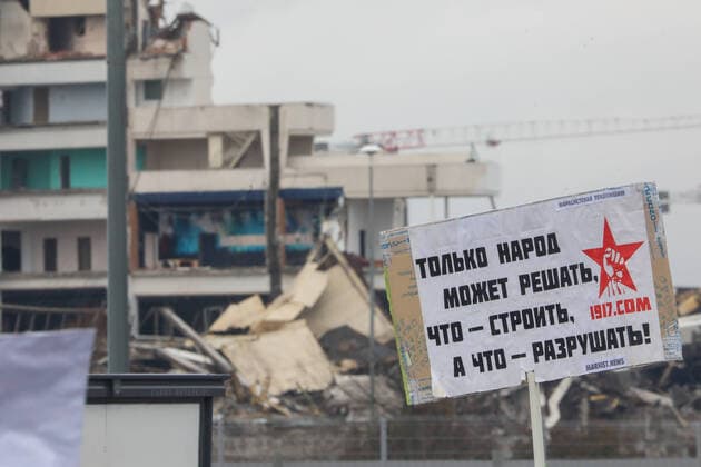 ST PETERSBURG, RUSSIA - FEBRUARY 2, 2020: A demonstrator holds a sign with a message reading Only the people can decide what should be built and what should be destroyed! during a protest against the ongoing dismantling of St Petersburg Sports and Concert Complex (also known as SKK); the protesters demanded that the building be restored and called for an investigation in connection with the death of a worker who died 31 January 2020 in a roof collapse at the site of the sports centre. Roman Pimenov TASS  TS0CCA5F