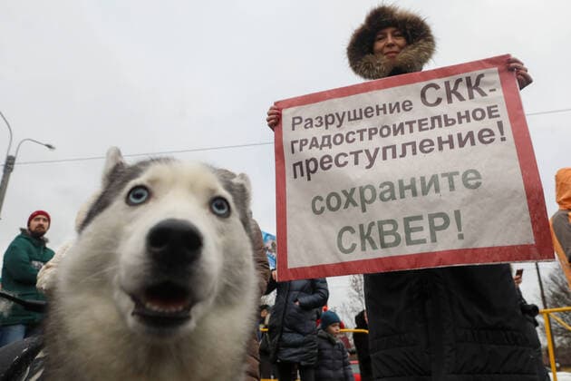 ST PETERSBURG, RUSSIA - FEBRUARY 2, 2020: A demonstrator holds a sign with a message reading The destruction of SKK is a city planning crime! Keep the garden! during a protest against the ongoing dismantling of St Petersburg Sports and Concert Complex (also known as SKK); the protesters demanded that the building be restored and called for an investigation in connection with the death of a worker who died 31 January 2020 in a roof collapse at the site of the sports centre. Roman Pimenov TASS  TS0CCA63