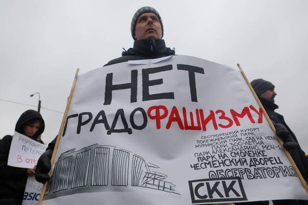 ST PETERSBURG, RUSSIA - FEBRUARY 2, 2020: A demonstrator holds a sign with a message reading No to Fascist Urban Planning! during a protest against the ongoing dismantling of St Petersburg Sports and Concert Complex (also known as SKK); the protesters demanded that the building be restored and called for an investigation in connection with the death of a worker who died 31 January 2020 in a roof collapse at the site of the sports centre. Roman Pimenov TASS  TS0CCA68