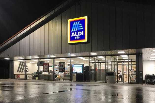 ALDI South branch, illuminated at night, food discounter, sign, logo, company emblem,