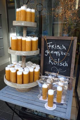Candle shop in the southern part of Cologne, here with Kölsch glasses made of wax