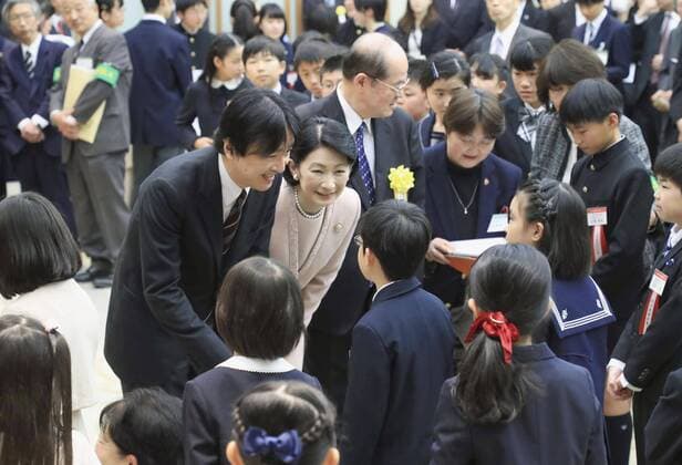 Japanese crown prince, princess at book report contest Japanese Crown Prince Fumihito (L) and Crown Princess Kiko (C) talk to the winners of a book report contest for young people in Tokyo on Feb. 7, 2020, following the award ceremony. (Pool photo) 