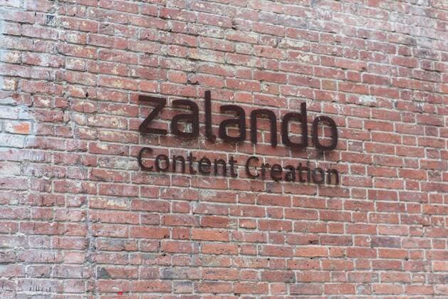 Feature zalando Germany, Berlin 04 02 2020 The picture shows the logo of zalando content creation on a brick wall Berlin Berlin Germany