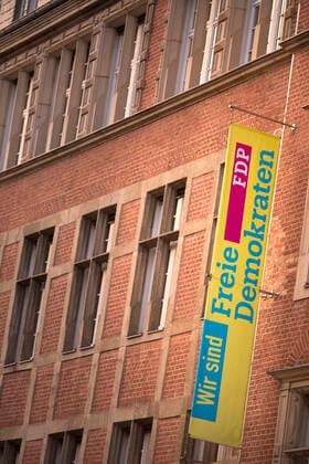 FDP flag with logo on the facade of the FDP federal office in Berlin 08 02 2020, Berlin, GER FDP flag with logo on the facade of the FDP federal office in Berlin, Berlin Berlin Germany FDP federal office