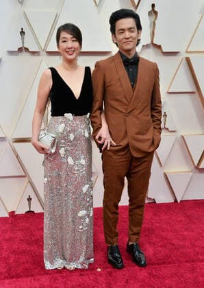 John Cho (R) and Kerri Higuchi arrive for the 92nd annual Academy Awards at the Dolby Theatre in the Hollywood section of Los Angeles on Sunday, February 9, 2020.  LAP20200209058 JIMxRUYMEN