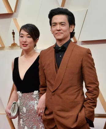 John Cho (R) and Kerri Higuchi arrive for the 92nd annual Academy Awards at the Dolby Theatre in the Hollywood section of Los Angeles on Sunday, February 9, 2020.  LAP20200209059 JIMxRUYMEN