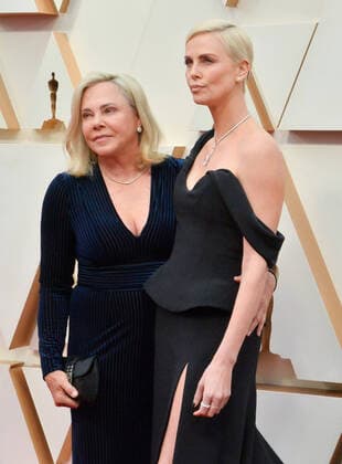 Gerda Maritz (L) and Charlize Theron arrive for the 92nd annual Academy Awards at the Dolby Theatre in the Hollywood section of Los Angeles on Sunday, February 9, 2020.  LAP20200209239 JIMxRUYMEN