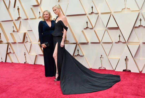 Gerda Maritz (L) and Charlize Theron arrive for the 92nd annual Academy Awards at the Dolby Theatre in the Hollywood section of Los Angeles on Sunday, February 9, 2020.  LAP20200209241 JIMxRUYMEN