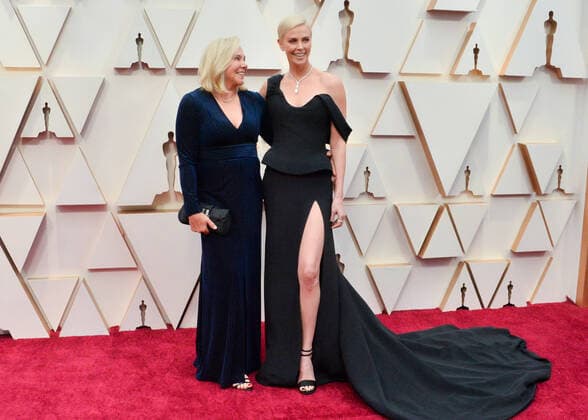 Gerda Maritz (L) and Charlize Theron arrive for the 92nd annual Academy Awards at the Dolby Theatre in the Hollywood section of Los Angeles on Sunday, February 9, 2020.  LAP20200209237 JIMxRUYMEN