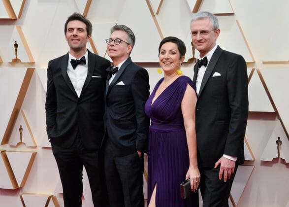 Bruno Collet (2nd L) and Jean-Francois Le Carre (R) arrive for the 92nd annual Academy Awards at the Dolby Theatre in the Hollywood section of Los Angeles on Sunday, February 9, 2020.  LAP20200209372 JIMxRUYMEN