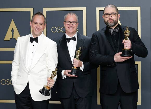 Jonas Rivera, Mark Nielsen and Josh Cooley, winners of Animated Feature Film for Toy Story 4, appear backstage with their Oscars during the 92nd annual Academy Awards at Loews Hollywood Hotel in the Hollywood section of Los Angeles on Sunday, February 9, 2020.  LAP20200209401 JOHNxANGELILLO