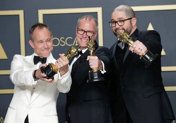 Jonas Rivera, Mark Nielsen and Josh Cooley, winners of Animated Feature Film for Toy Story 4, appear backstage with their Oscars during the 92nd annual Academy Awards at Loews Hollywood Hotel in the Hollywood section of Los Angeles on Sunday, February 9, 2020.  LAP20200209404 JOHNxANGELILLO