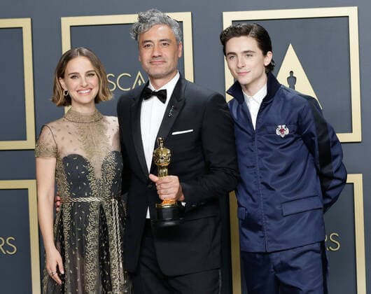 (L-R) Natalie Portman and Taika Waititi, winners of the Adapted Screenplay award for Jojo Rabbit, and Timothée Chalamet, appear backstage with their Oscars during the 92nd annual Academy Awards at Loews Hollywood Hotel in the Hollywood section of Los Angeles on Sunday, February 9, 2020.  LAP20200209420 JOHNxANGELILLO