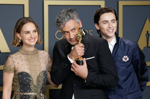 (L-R) Natalie Portman and Taika Waititi, winners of the Adapted Screenplay award for Jojo Rabbit, and Timothée Chalamet, appear backstage with their Oscars during the 92nd annual Academy Awards at Loews Hollywood Hotel in the Hollywood section of Los Angeles on Sunday, February 9, 2020.  LAP20200209423 JOHNxANGELILLO