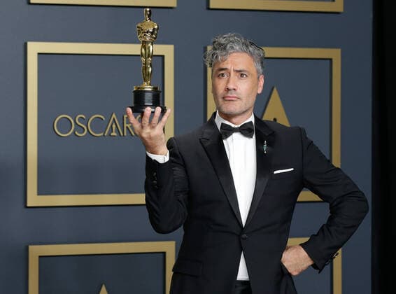 Taika Waititi, winner of the Adapted Screenplay award for Jojo Rabbit, appears backstage with his Oscar during the 92nd annual Academy Awards at Loews Hollywood Hotel in the Hollywood section of Los Angeles on Sunday, February 9, 2020.  LAP20200209438 JOHNxANGELILLO