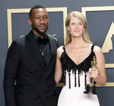 Mahershala Ali (L), with Laura Dern, winner of the Best Actress in a Supporting Role for Marriage Story, appears backstage with her Oscar during the 92nd annual Academy Awards at Loews Hollywood Hotel in the Hollywood section of Los Angeles on Sunday, February 9, 2020.  LAP20200209714 JOHNxANGELILLO