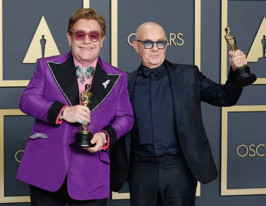 Elton John (L) and Bernie Taupin, winners of Best Original Song for (I m Gonna) Love Me Again for Rocketman, appear backstage with their Oscars, during the 92nd annual Academy Awards at Loews Hollywood Hotel in the Hollywood section of Los Angeles on Sunday, February 9, 2020.  LAP20200209795 JOHNxANGELILLO