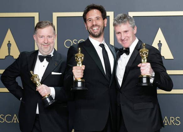 (L-R) Dominic Tuohy, Guillaume Rocheron and Greg Butler, winners of Best Visual Effects for 1917, appear backstage with their Oscar, during the 92nd annual Academy Awards at Loews Hollywood Hotel in the Hollywood section of Los Angeles on Sunday, February 9, 2020.  LAP20200209812 JOHNxANGELILLO