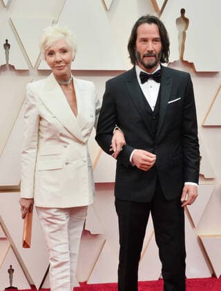 Patricia Taylor (L) and Keanu Reeves arrive for the 92nd annual Academy Awards at the Dolby Theatre in the Hollywood section of Los Angeles on Sunday, February 9, 2020.  LAP20200209651 JIMxRUYMEN